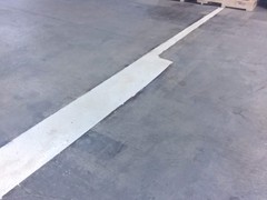 These are some repairs we did in a warehouse the gets a loy of wear and tear on the floor. We used a product called Flexcrete to make the repairs to the floor. This product is a very durable and strong product.">