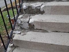 These steps had severe damage, including cracking and chunks missing.